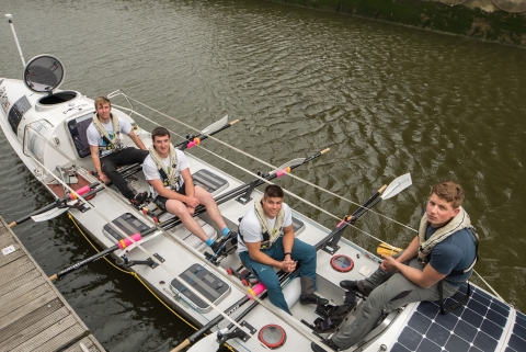 team of rowers from the university in their rowboat