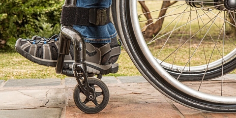 Man's legs seen in wheelchair