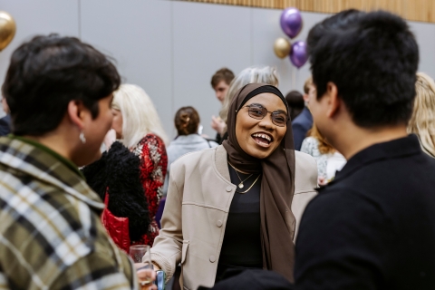 Three people talking