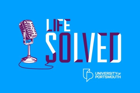 logo illustrated by a microphone connected to the words Life Solved