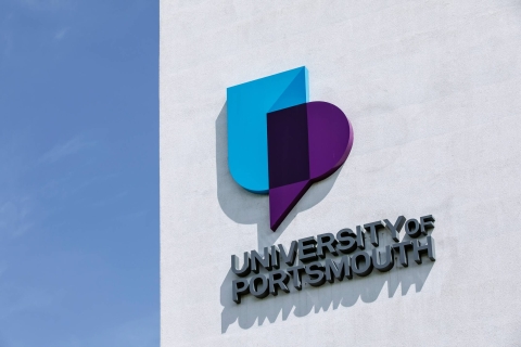 University of Portsmouth logo on building