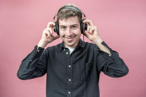 Vadim Marchenko smiling and wearing headphones