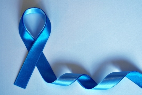 A blue ribbon used to signify prostate cancer awareness