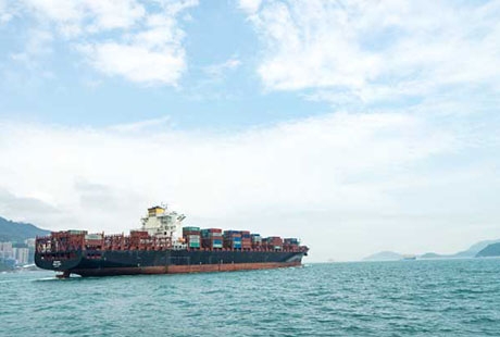 Laden cargo ship at sea