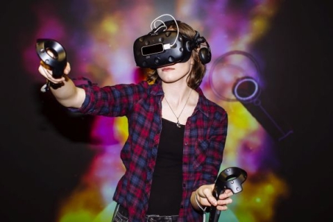 Female student wearing VR headset