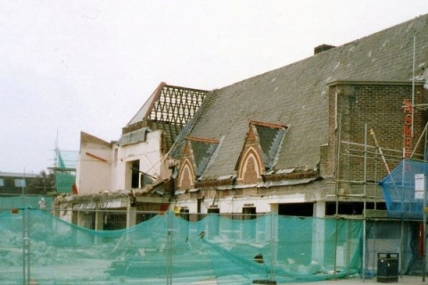 A photograph of St Stephen's Chapel through the netting of the surrounding building site.