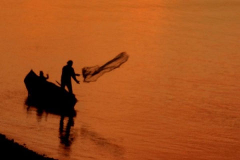 Fisherman in sunset - Photo by Jacqueline O'Gara on Unsplash