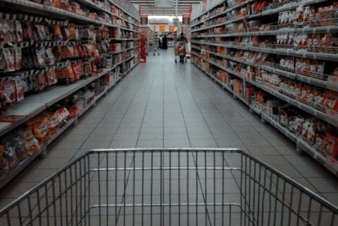 A supermarket aisle seen from above a trolley
