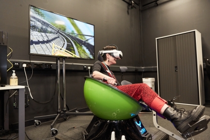 Person using CCIXR's virtual reality lab rollercoaster simulator 