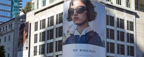 A Burberry billboard advert on the corner of a building in Los Angeles, California. Photo by Pete Pedroza.
