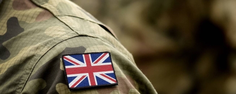 Close up of an armed forces member's shoulder, showing a British flag patch.