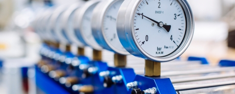 a row of pressure gauges 