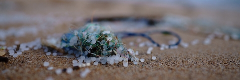 Microplastics and synthetic fibres on a beach