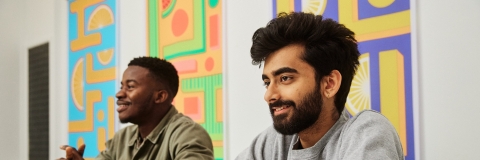 Two men studying in a group