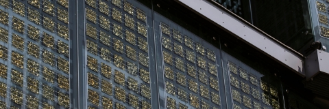 Two students looking at a computer screen 