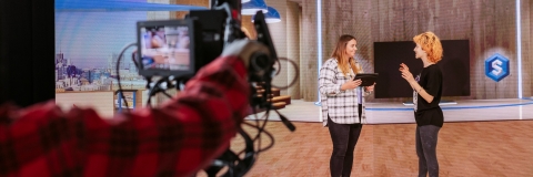 Three Students utilising the CCIXR Smart Stage Studio.