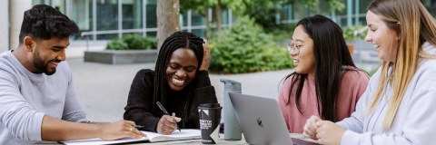 Four University of Portsmouth students talking