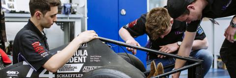 Engineering Project Day, 30th April 2019; students working on formula student race car