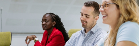 Postgraduate students studying in a seminar room