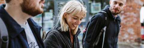 Three students walking through Old Portsmouth together
