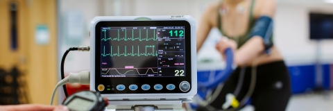  Heart rate monitor tracking a student on exercise bike