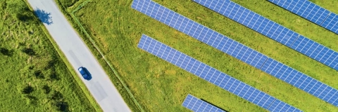 aerial picture of solar panels in a field