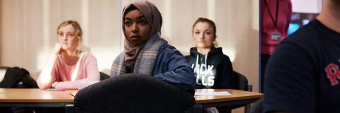 female student paying attention during a lecture