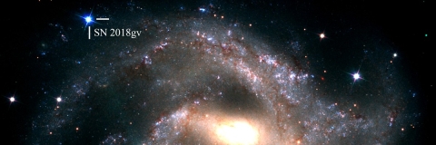 Image of spiral galaxy NGC 2525 with a supernova on it's outer edge, labelled sn2018gv
