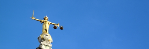 Statue on top of law courts, London