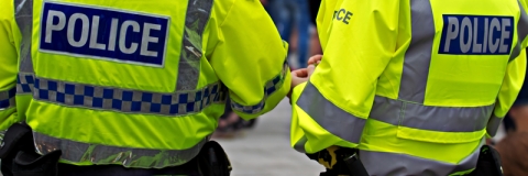 Two police officers in high visibility uniform