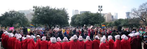 Group of women protesting dressed as characters from The Handmaids Tale