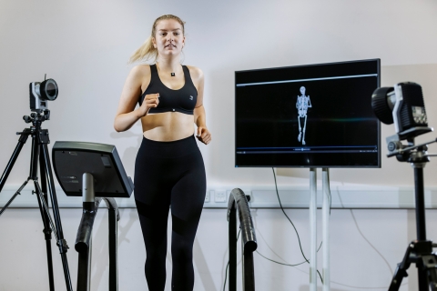 Woman on a treadmill having a breast health examination 