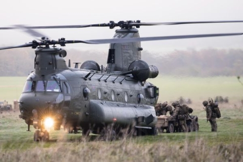 A picture of a military Chinook helicopter on the ground