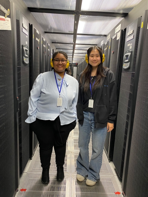 Figure 1 Image of Dascha (Science Content Management, left) and Rui (Science Communications, right) in the Data Centre at building R89 at STFC.