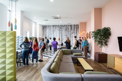 Student Ambassador giving accommodation tour of Catherine House Sky Lounge to students and parents  - Open Day 2023