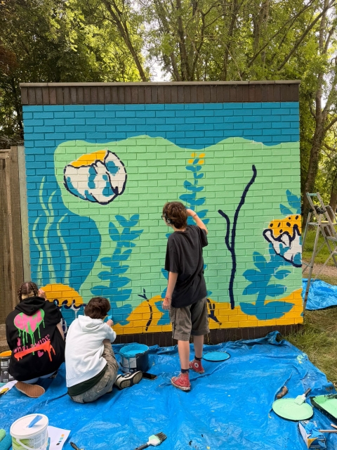 Students painting mural
