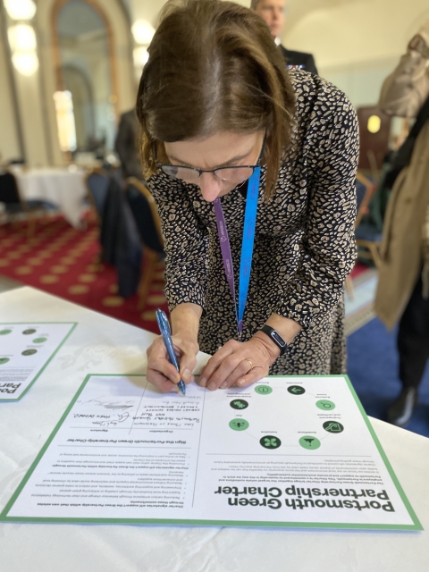 Bernie Topham signing the Portsmouth Green Charter