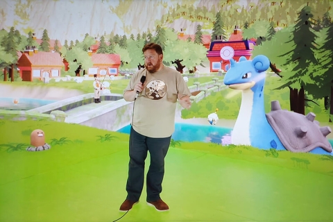 Lincoln giving a talk in the background of Pokemon Go world