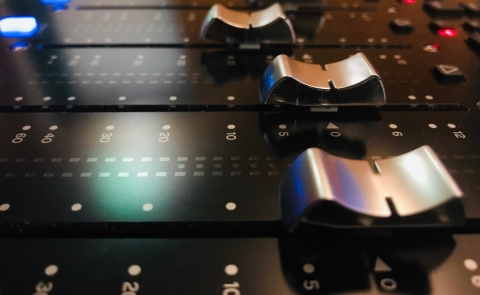 A close-up of sound faders