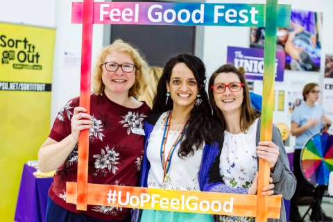 Staff and students smiling at the University Feel Good Festival