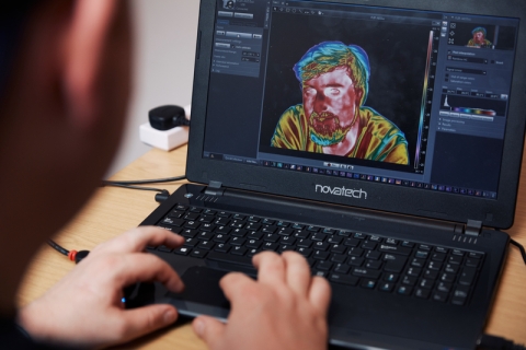 University of Portsmouth student playing around with thermal imaging on a computer