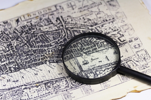 Ancient London map with a magnifier
