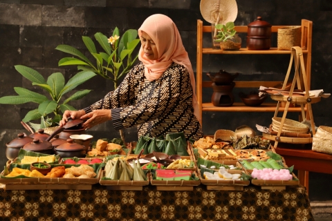 Female entrepreneur working on a market stall in Indonesia