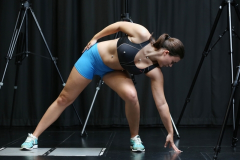 Person exercising while using motion capture technology