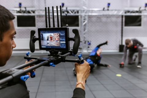 student with motion capture camera, recording a session
