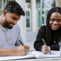 Teachers taking notes