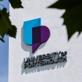 University of Portsmouth signage on building