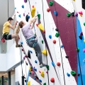 Students using the climbing wall at Ravelin Sports Centre