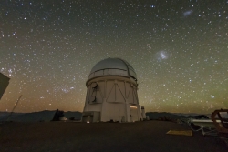 DES telescope exterior against night sky