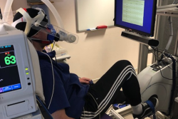 Man cycling in a PET scanner as part of a new study